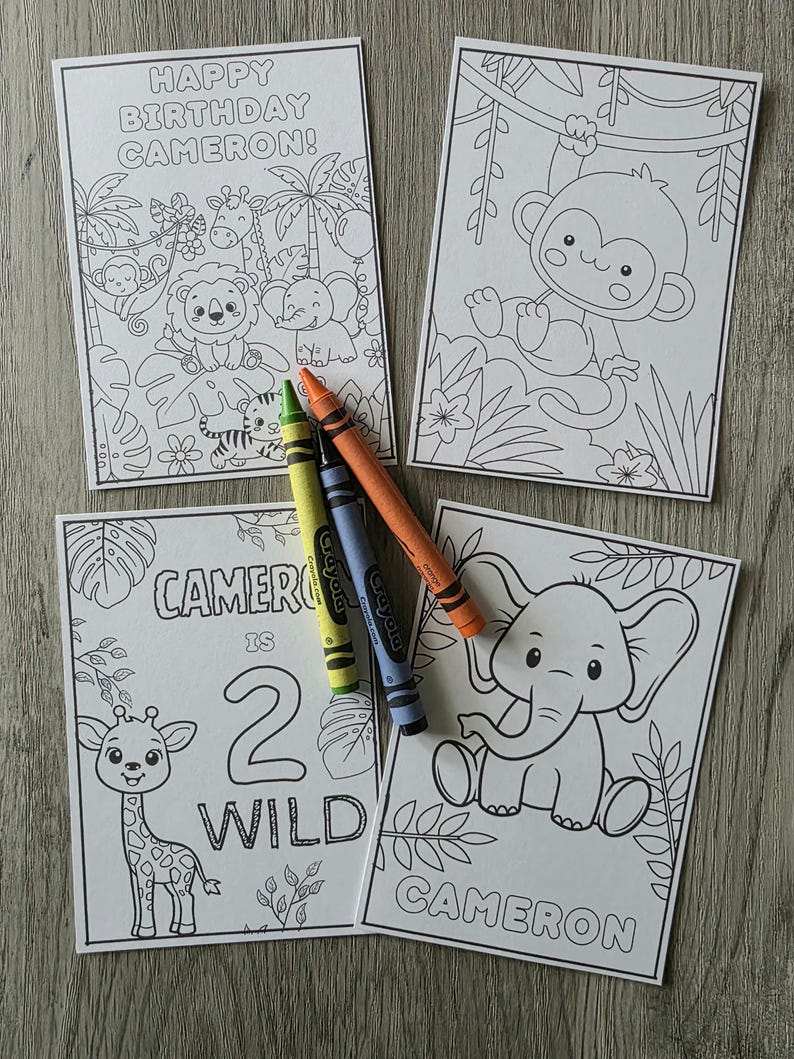 May include: Four coloring pages with jungle animal illustrations and the name "Cameron". One page says "Happy Birthday Cameron!" and another says "Cameron is 2 Wild". Crayons in yellow, green, blue, and orange are included.