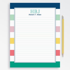 May include: A white notepad with blue, green, yellow, and pink stripes. The notepad has a blue border and the text "HBJ Hannah B. Jordan" at the top.