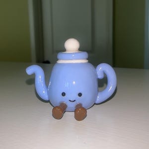 Baratija de arcilla inspirada en un gato de gelatina