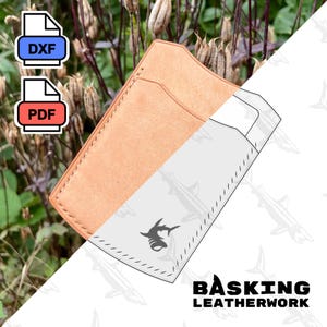 May include: A brown leather wallet pattern with a shark silhouette and the text "BASKING LEATHERWORK". The pattern is shown next to a brown leather wallet.