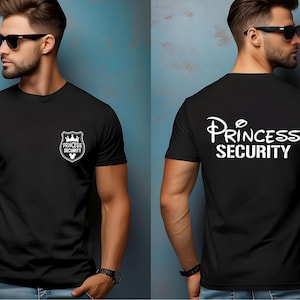 May include: Black t-shirt with the text "PRINCESS SECURITY" in white on the back and a shield graphic on the front. The shield graphic includes a crown and the words "PRINCESS SECURITY".