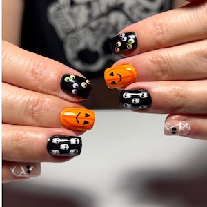 Halloween doodle nails - Halloween black and orange nails - luxury press on nails - gel x nail art - gel press on nails