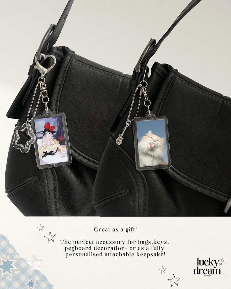 May include: Two black bags with attached keychains. One keychain has a star-shaped charm and a rectangular image of an anime character. The other keychain has a guitar charm and a rectangular image of a cat. Text reads: "Great as a gift!"