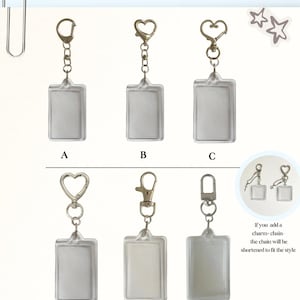 May include: Image featuring six clear rectangular keychains with different clasp styles: a heart-shaped clasp, a lobster clasp, and a round clasp. The text "Custom Clasps" is at the top. The keychains are labeled A through F. The Lucky Dream logo is at the bottom.