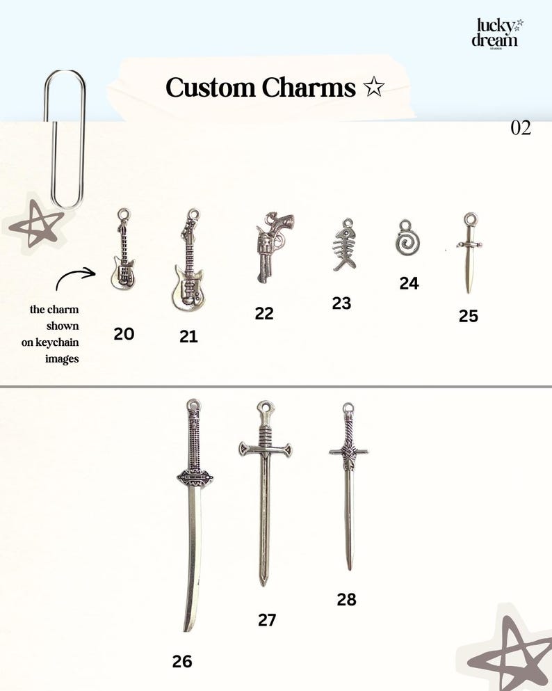 May include: A selection of silver-colored custom charms, including guitars, a revolver, a fish skeleton, a spiral, and swords. The text "Custom Charms" is displayed at the top of the image.