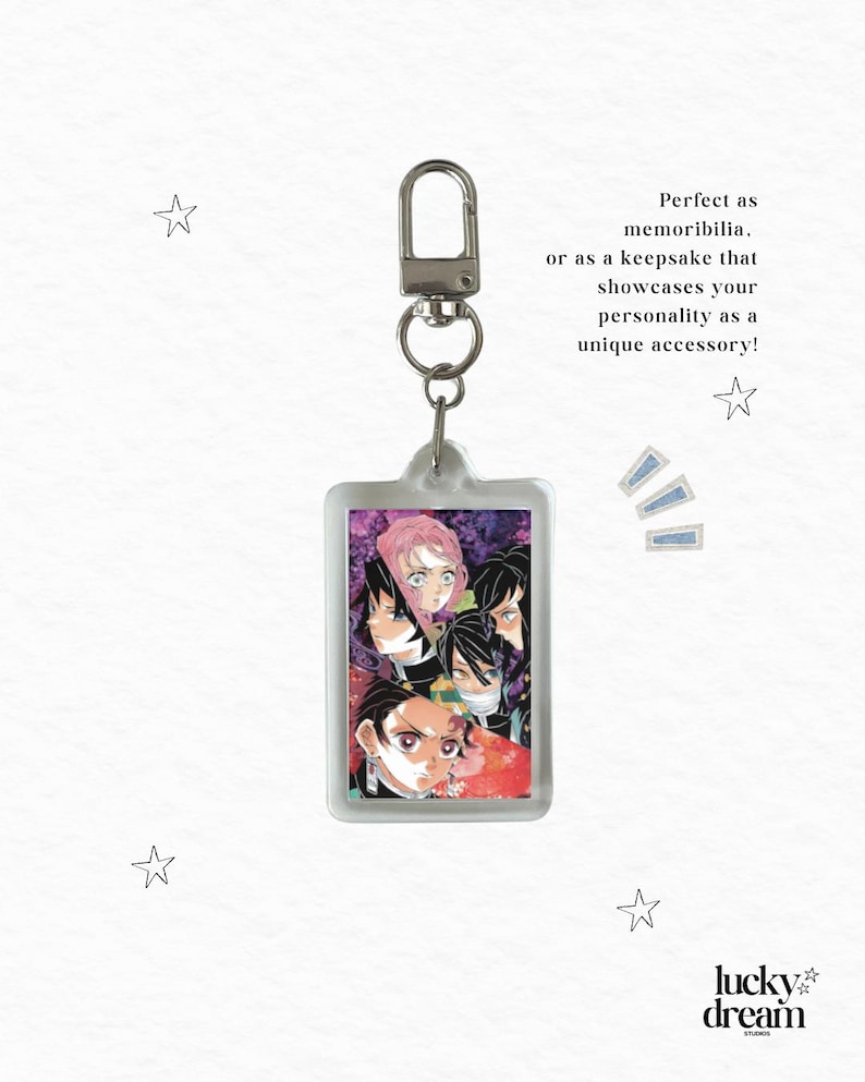 May include: A rectangular keychain featuring a colorful anime-style illustration of several characters. The keychain has a silver-colored clasp and a ring. The text on the image says, "Perfect as memorabilia, or as a keepsake that showcases your personality as a unique accessory!"