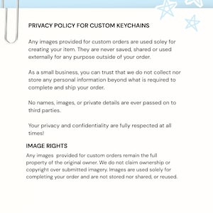May include: A white background with text detailing the privacy policy and image rights for custom keychains. The text is in black, with a silver paperclip in the upper left corner and blue star graphics.