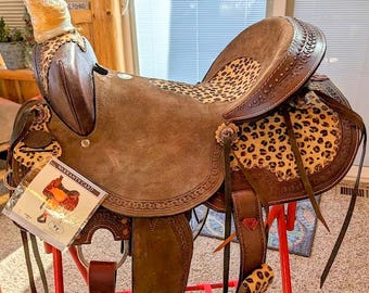 SPECIAL -  12" Barrel Style Saddle with Cheetah Seat and Leather Tassels