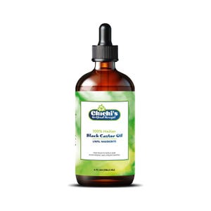 May include: A 118.3 ml bottle of 100% Haitian Black Castor Oil, labelled "Chichi's Orijinal Kreyol" and "LWIL MASKRITI". The bottle is brown glass with a dropper top and a green label with white text.