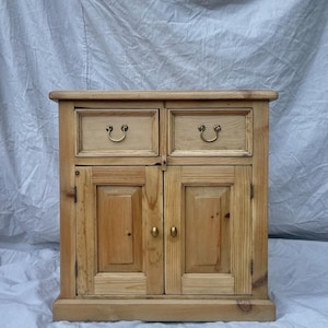 restored vintage pine side table with brass handles