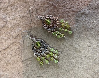 Artisan Earrings - 2 1/2” Featuring Wire Wrapped Peridot and Glass Beads with Silvertone Finding & Silver Plated Beads on French Wires.