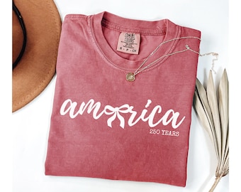 Americas 250 Year Anniversary Comfort Colors USA Shirt, Womens Patriotic TShirt, United States 250 Year Celebration Shirt Coquette Bow Shirt