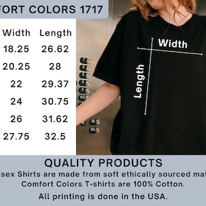 May include: Black Comfort Colors t-shirt with size chart. The chart shows measurements for sizes S to 3XL, with widths from 18.25 to 27.75 inches and lengths from 26.62 to 32.5 inches. The shirt is made of 100% cotton.