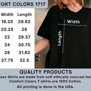 May include: Black Comfort Colors 1717 t-shirt with size chart. The chart shows measurements for sizes S to 3XL, with widths ranging from 18.25 to 27.75 inches and lengths from 26.62 to 32.5 inches. The shirt is made of 100% cotton.