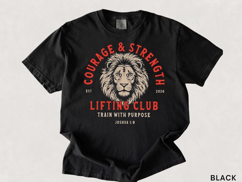 May include: Black t-shirt with a lion's head graphic and the words "Courage & Strength" in a circular design. Below the lion is "Lifting Club" and "Train with Purpose". The shirt also has the text "Joshua 1:9".