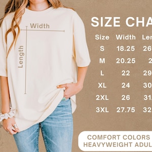 May include: A cream-colored heavyweight adult tee shirt with a size chart. The size chart shows the width and length measurements in inches for sizes S through 3XL. The shirt is from Comfort Colors.