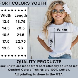 May include: A young person wearing a white Comfort Colors youth t-shirt. The image includes a size chart with measurements in inches. Text on the image reads "COMFORT COLORS YOUTH" and "QUALITY PRODUCTS". The shirts are made from ethically sourced materials and 100% cotton.