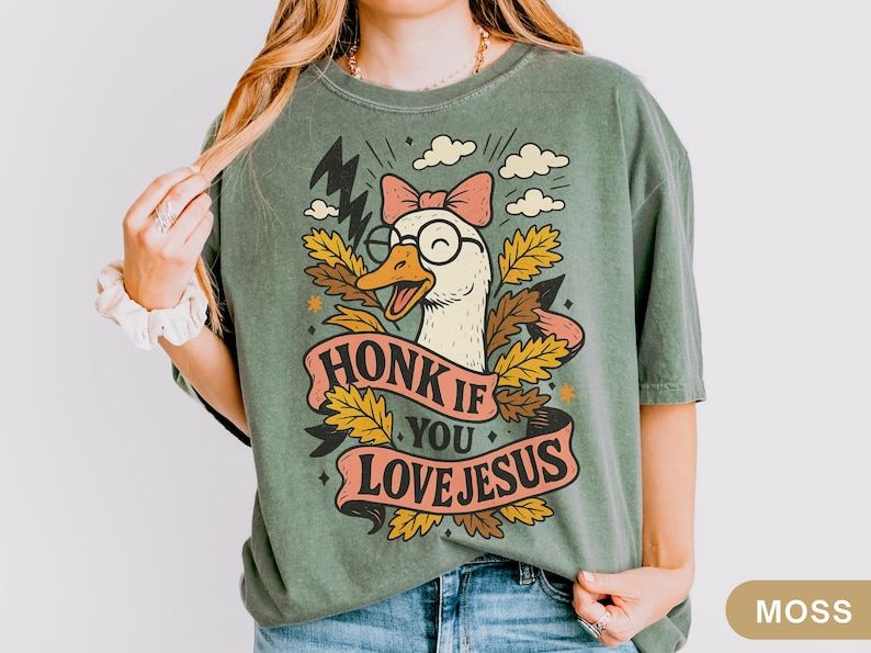 Trendy Silly Goose with a cute coquette bow and edgy lightening bolt design with a banner that says "honk if you love Jesus". Makes a great gift for Gen Z or Millennial Christians, Catholic friends or anyone looking for share the Gospel.