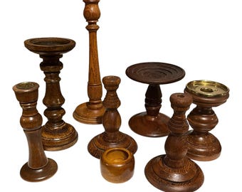 Set di 8 candelabri vintage in legno.