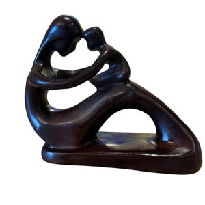 Abstract Sculpture Depicting a Mother and Child.