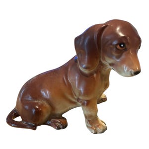 Vintage Dachshund Ceramic Figurine made by Lefton in the 1940s.