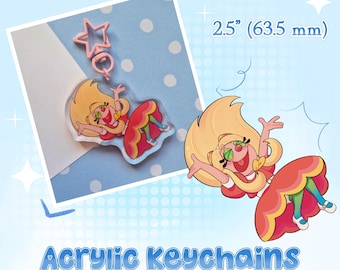 May include: A 2.5 inch acrylic keychain featuring a cartoon character with blonde hair, a red dress, and rainbow leggings. The keychain has a light pink star-shaped clasp. The text "Acrylic Keychains" is printed at the bottom of the image.