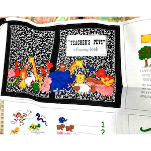 May include: A black and white fabric with a colorful illustration of animals on a notebook paper background. The text "TEACHER'S PETS" and "a learning book" is printed on the fabric.