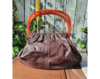 Bolso vintage de mujer con asa de baquelita, bolso de punto de cuero, década de 1940