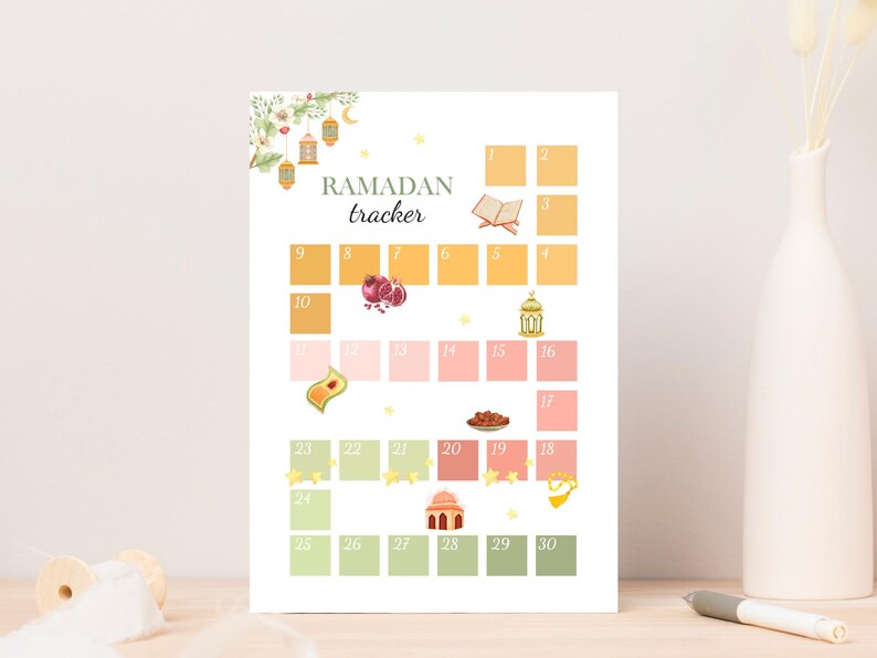 May include: A printable Ramadan tracker with a floral design and illustrations of lanterns, pomegranates, dates, and a mosque. The tracker has 30 boxes for each day of Ramadan.
