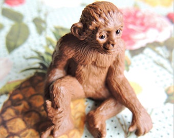 small plastic monkey figures