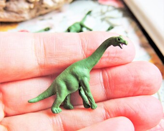 tiny dinosaur figures