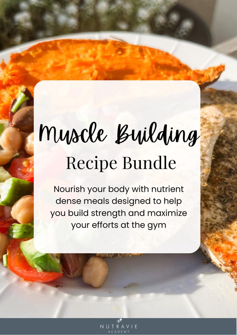 May include: A white plate with a colorful salad of tomatoes, cucumbers, chickpeas, and olives. A baked sweet potato and a piece of chicken are on the plate. The text "Muscle Building Recipe Bundle" is on a white rectangle with a black border. The text "Nourish your body with nutrient dense meals designed to help you build strength and maximize your efforts at the gym" is below the title. The text "NUTRAVIE ACADEMY" is at the bottom of the image.