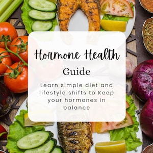 May include: A white plate with grilled salmon, cucumbers, tomatoes, and lemon wedges. The plate is on a wooden surface with a text overlay that reads "Hormone Health Guide Learn simple diet and lifestyle shifts to Keep your hormones in balance NUTRAVIE ACADEMY".