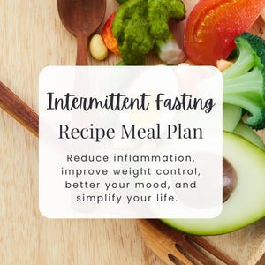May include: A wooden cutting board with a variety of fresh vegetables, including avocado, broccoli, tomatoes, and green beans. The text "Intermittent Fasting Recipe Meal Plan" is written on a white rectangle in the center of the image. The text below reads "Reduce inflammation, improve weight control, better your mood, and simplify your life." The text "NUTRAVIE ACADEMY" is at the bottom of the image.