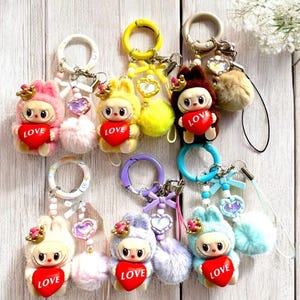 Monster Love Keychain: Pom Pom Charm, Heart Pendant & Phone Strap