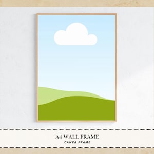 Puede incluir: Marco de pared A4 con un diseño de paisaje. La obra de arte presenta un cielo azul con una nube blanca, colinas verdes y un marco marrón claro. El texto "A4 WALL FRAME" y "CANVA FRAME" está en la parte inferior.