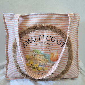 Bolso de playa a rayas rosas y crema