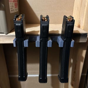 Soporte de pared para cargador AK-V de 9 mm