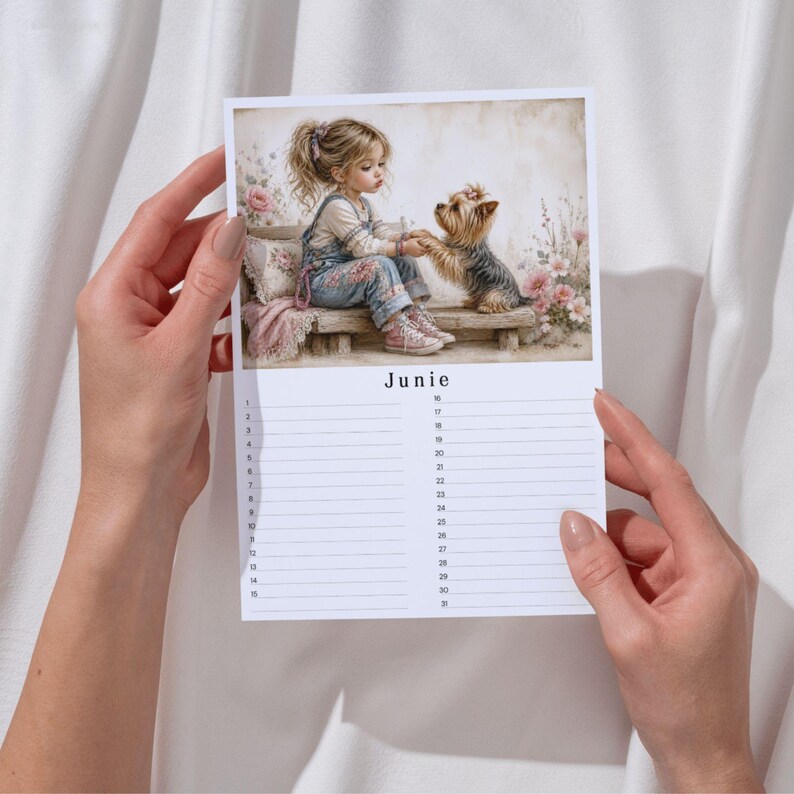 May include: A calendar page for the month of Junie featuring an illustration of a child in denim overalls and pink trainers sitting on a bench with a small Yorkshire Terrier. The calendar includes a numbered list from 1 to 31 for daily notes.