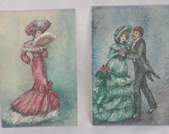 Dos pequeñas pinturas firmadas de una dama victoriana y una pareja victoriana a juego