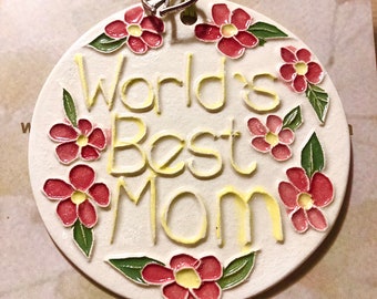 WORLDS BEST MOM Ornament! Handmade and surprisingly lightweight ceramic original ornament. Arrives neatly gift bagged and ready to give!