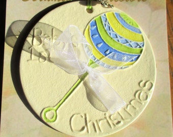 BABY BOY'S 1st CHRISTMAS Ornament handmade ceramic raised texture with patterned rattle and white + real ribbon bow gift & gift bag