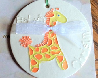 BABYS FIRST CHRISTMAS handmade spotted giraffe ceramic ornament! Always appreciated. Arrives neatly gift bagged!