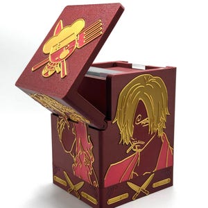 OPTCG Deckbox Sanji Black Leg Vinsmoke Strohhut Koch Chef | Passend für dreifach ummantelte Karten mit verstecktem Boden | Mini Snap inklusive, Optional Würfel