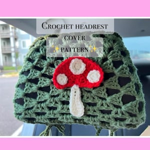 May include: A green crochet headrest cover with a red mushroom applique featuring white spots. The text "Crochet Headrest Cover Pattern" is displayed on the cover. The headrest cover is designed to fit a car seat.