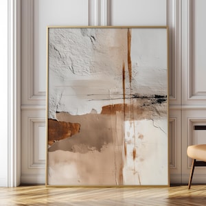 Peut inclure: Impression d'art abstrait dans un cadre doré. L'œuvre présente un design texturé et superposé avec des nuances de blanc, de marron et de noir. La composition comprend des coups de pinceau verticaux et horizontaux, créant une esthétique moderne. L'œuvre est exposée contre un mur blanc.