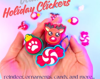 May include: A collection of colorful holiday-themed clickers, including a reindeer, ornaments, and candy designs. The image features the text "Ultimate Holiday Clickers" and "reindeer, ornaments, candy, and more..."