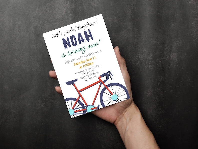 May include: A birthday party invitation featuring a red bicycle illustration. The invitation includes the text "Let's pedal together!" and details for Noah's ninth birthday, including the date, time, and location. The invitation is held in a hand.