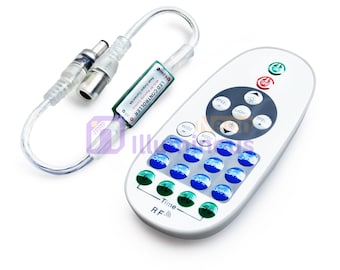 May include: White LED controller with multiple buttons and a connected cable. The controller has buttons labeled "SPEED", "LIGHT", and "MODE", along with buttons with percentages. The cable has a green LED controller box with text.