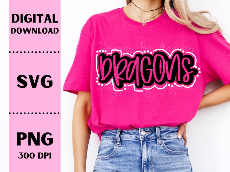 May include: A pink t-shirt with the word "DRAGONS" in black and white lettering. The shirt is being worn by a person.